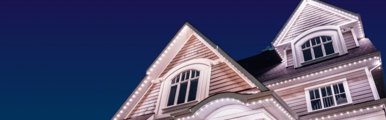 Front view of a house with Gemstone LED Lights on it