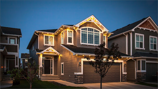Exterior view of a house lit up with permanent LED pot lightsExterior view of a house lit up with permanent LED pot lights